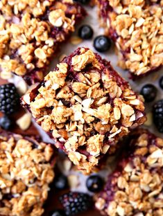 blueberry granola bars with fresh berries on top