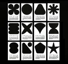 several different shapes and sizes are shown in black and white paper on a black background