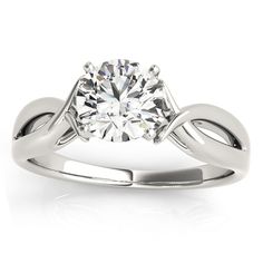 a white gold engagement ring with a twisted design