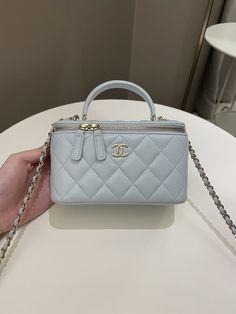 Chanel 21K Top Handle Vanity RectangularBaby Blue Lambskin LGHWSize 16 x 10 x 8 cmChain drop 54 cmSeries 31Sept 2021New w Seal (minimal storage sign if any otherwise new unused)Includes full set box, dust bag and ity card and receiptPrice now 3350 sgd 2530 usd CN5993-03 Storage Sign, Luxury Bags Collection, Womens Designer Bags, Vanity Bag, Girly Bags, Luxury Purses, Pack Your Bags, Pretty Bags, Cute Bags