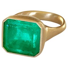 Dalben design One of a Kind 18k yellow gold satin finishing ring with a magnificent 8,3 carat bezel-set emerald cut Colombian emerald. The Colombian emerald is accompanied by IGI (Italian Gemological Institute ) Certificate. Ring size 7 1/4 USA - EU 55 re-sizable to most finger sizes. Bezel stone dimensions : width 14,9 mm height 13,4 mm The ring has been designed and handcrafted in our atelier in Como Italy with a rigorous quality workmanship . Modern Octagon Emerald Ring For Formal Occasions, Rectangular Gold Emerald Ring With Bezel Setting, Formal Emerald Ring With Rectangular Stone And Bezel Setting, Formal Gold Emerald Cut Emerald Ring, Formal Emerald Cut Signet Ring, Formal Emerald Ring With Rectangular Shape, Formal Rectangular Emerald Ring, Modern Octagon Emerald Ring In Yellow Gold, Classic Emerald Ring With Rectangular Bezel Setting