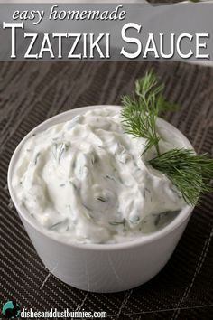 a white bowl filled with homemade tzatziki sauce