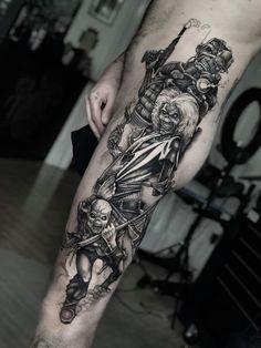 a man with a tattoo on his leg