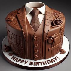 a birthday cake with a suit and tie on it