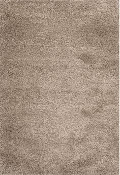 an area rug with various colors and sizes on the floor, including beige carpeting