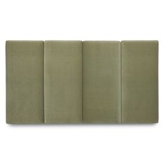 the back side of an upholstered headboard with four panels on each side