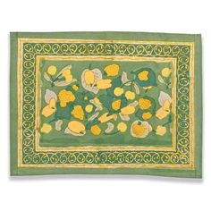 a green and yellow square with flowers on it