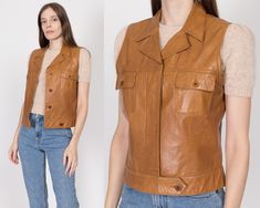 Vintage 90s vest by Ralph Lauren Sport in a buttery soft caramel brown leather. It has hidden buttons down the front, with an inner and outer button at the waistband for closure, and two buttoned chest pockets. Fully lined. Measurements and Condition:  Fits like: Women's medium Fabric: Leather shell with acetate lining Brand: Ralph Lauren Sport Condition: Very good, with light general wear, and some minor faint dark discoloration at the inside back of the collar and inside edges of the underarms Retro Brown Vest For Work, Classic Brown Vest For Spring, Brown Leather Vest For Spring, Brown Leather Spring Vest, Retro Brown Vest For Workwear, Leather Vest Women Brown, Vintage Brown Sleeveless Outerwear, Vintage Brown Leather Jacket With Buttons, 90s Vest