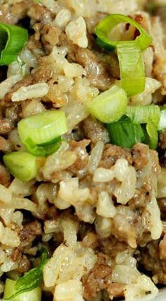 rice with meat and vegetables in a white bowl