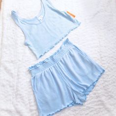 Incredibly Soft & Light Set. Crop Tank Top Scoop Neck Wide Straps Appx Flat Measure 16" X 16" Elastic Paperbag Waist Shorts On Seam Pockets Lettuce Hem Appx Flat Measure 14" Across Waist 13" Long At Side Seam 1 3/4" Inseam Hot Summer Nights Baby Blue Matching Set Matching Knit Set Lounge Wear Short Set 2 Piece Paper Bag Shorts Crop Tank Top Blue Summer Top, Short Length, Blue Summer Top In Short Length, Summer Blue Top In Short Length, Blue Casual Top With Short Length, Comfortable Blue Tops For Vacation, Light Wash Tops For Summer Loungewear, Light Wash Tops For Loungewear, Lounge Wear Shorts, Knit Lounge Set