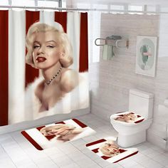 a marilyn monroe shower curtain and rug in a white bathroom with red accents on the floor