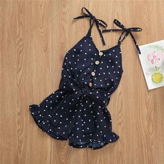 This lovely cotton/poly sleeveless romper is sooo cute. The polka dots and detail are perfect. Perfect summer romper. Short Jumpsuit Outfit, Overalls Summer, Girls In Suspenders, Shorts Jumpsuit, Toddler Jumpsuit, Sleeveless Romper Jumpsuits, Chiffon Romper, Minimalist Fashion Casual, Straps Jumpsuit