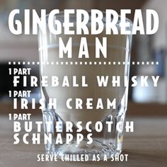 an advertisement for a gingerbread man with a shot glass in the foreground and words below it