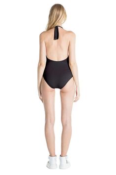 Marina halter one piece swimsuit in black Elegant Backless Halter Top For Beach, Elegant Halter Top For Poolside, Fitted Low Back Swimwear With Back Opening, Elegant Fitted Halter Top For Poolside, Chic Black Swimwear With Moderate Back Coverage, Elegant Halter Neck Top For Poolside, Sleek Swimwear With Moderate Back Coverage For Pool, Sleek Swimwear For Pool With Moderate Back Coverage, Elegant Halter Neck Swimwear With Built-in Bra