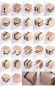 many different types of wooden blocks with black lines on the sides and one in the middle