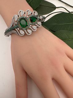 Openable Victorian Finish Bracelet fits sizes 2.4 and 2.6Color : Victorian Size : Fits Sizes 2.4 and 2.6Stones : AD --Color-- Stones Green Stone Bracelets For Party, Green Cubic Zirconia Bracelets With Hand Set, Green Cubic Zirconia Hand Set Bracelets, Adjustable Green Cubic Zirconia Jewelry, Green Crystal Round Bracelets, Green Bangle Crystal Bracelet For Formal Occasions, Green Crystal Bangle Bracelet For Formal Occasions, Traditional Bracelet, Antique Necklace Victorian