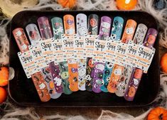 the halloween nail polishes are on display