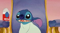 an image of stitch with toothpaste in the mouth and lilpui on it's back