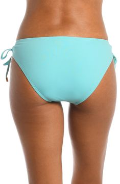 Classic bikini bottoms are charmed by bead-tipped ties at the sides that adjust to the perfect fit and look for you. Full back coverage Lined 83% nylon, 17% elastane Hand wash, line dry Imported Blue Swimwear With Side Ties For Sunbathing, Blue Side Ties Beachwear Swimwear, Tie-side Bottom Swimwear For Pool, Adjustable Side Ties Beach Bottoms, String Tie Bottoms For Pool And Beach Season, Blue Swimwear With Side Ties For Beach, Blue Side Ties Swimwear For Beach, Adjustable Side Ties Swim Bottoms, Beach Party Tie-side Bottoms With Drawstring