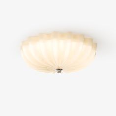 a white ceiling light against a white background