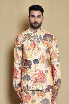 Cream sleeveless bundi in silk base with all over Rajasthani rural art print, mirror hand embroidered mandarin collar and stitch lines detailing. Paired with a matching full sleeves kurta and gold pant. - Aza Fashions Print Mirror, Gold Pants, Kurta Set For Men, Stitch Lines, Cream Silk, Kurta Set, Full Sleeves, Mandarin Collar, Aza Fashion