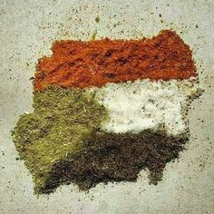 various spices are arranged in the shape of a map