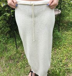 "80's Vintage Tan Knit Maxi Skirt 80's Vintage Tan Knit Maxi sweater Skirt with elastic drawstring waist, and ribbed hem. This skirt has lots of give/stretch in the fabric. Listing for skirt only. Tag: Joan Vass Measurements: Waist: 25\" elastic Hips: 30\" Length: 34\"" Sweater Maxi Skirt, Tan Knit Sweater, Maxi Sweater, Knit Maxi Skirt, 80s Vintage, Sweater Skirt, Drawstring Waist, Knit Sweater, Maxi Skirt