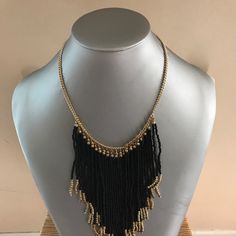 Black N Gold Tassel Necklace Elegant Tassel Necklace With Fringe For Party, Party Necklaces With Tassels And Dangle Shape, Party Dangle Necklaces With Tassels, Party Tassel Dangle Necklaces, Fringe Tassel Necklace For Party, Black Tassel Jewelry For Party, Party Tassel Necklace With Adjustable Chain, Black Tassel Party Jewelry, Metal Tassel Necklace For Party