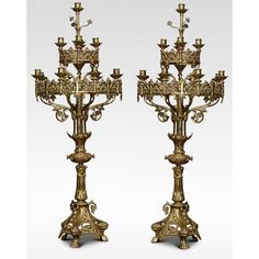 a pair of antique brass candelabra candlesticks