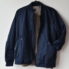 Bundle 2 Or More Items For 40% Off Navy Water Resistant Bomber Jacket, Never Worn Size M Navy Outerwear With Ribbed Cuffs For Fall, Navy Outerwear For Cold Weather In Fall, Blue Outerwear With Pockets For Layering, Blue Outerwear With Ribbed Cuffs For Fall, Classic Navy Outerwear With Ribbed Cuffs, Casual Navy Outerwear For Layering, Classic Blue Outerwear For Layering, Navy Outerwear For Spring Layering, Navy Long Sleeve Outerwear For Layering