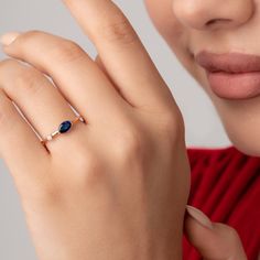 ❤️ Oval-Cut Birthstone Ring ❤️ H O W ∙ T O ∙ O R D E R 1- Select your preferred Finish from the menu. 2- Choose your Ring Size. 3- Please write your preferred birthstone in the Personalization Box. You can find our stone chart in the last picture. P R O D U C T ∙ D E T A I L S Band Width: 1.3 mm Oval Stone Size: 6mm by 4mm Diamond Stone Size is 1.50mm * Birthstone Rings can be personalized with the following BIRTHSTONE COLORS: January Birthstone: Garnet February Birthstone: Amethyst March Birthstone: Aquamarine April Birthstone: Diamond May Birthstone: Emerald June Birthstone: Alexandrite July Birthstone: Ruby August Birthstone: Peridot September Birthstone: Sapphire October Birthstone: Pink Tourmaline November Birthstone: Citrine December Birthstone: Blue Topaz W H Y ∙ CHOOSE ∙ THIS ∙ GLA Dainty Sapphire Oval Ring, Gift Marquise Cut Ring With Bezel Setting, Marquise Cut Bezel Set Ring For Gift, Marquise Cut Ring With Bezel Setting As Gift, Marquise Cut Birthstone Diamond Ring Gift, Sapphire Ring With Halo For Gift, Oval Sapphire Diamond Ring As Gift, Fine Jewelry Birthstone Ring With Oval Cabochon, Fine Jewelry Oval Cabochon Birthstone Ring Gift