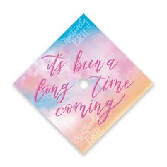 a pink and blue graduation cap with the words, it's been a long time coming