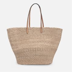 Luxury Jute Straw Bag With Braided Handles, Brown Bucket Bag With Long Handle, Beige Beach Bag With Leather Handles For Shopping, Neutral Straw Tote Bag For Shopping, Neutral Straw Bag With Handles, Brown Woven Leather Straw Bag For Shopping, Neutral Straw Bag With Braided Handles For Shopping, Neutral Straw Bags With Braided Handles, Elegant Brown Beach Bag With Adjustable Strap