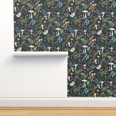 an image of a wallpaper with mushrooms and leaves on it in the corner of a room