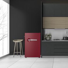 a red refrigerator sitting in the middle of a kitchen