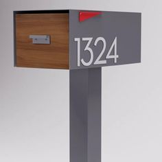 a mailbox with the number 1234 on it's front and side panels