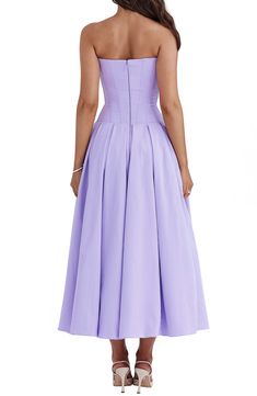 All eyes will be on you in this lilac-hued dress built with a sculpted boned bodice, molded butterfly neckline and a voluminous skirt buoyed by layers of tulle. Exclusive retailer Hidden back-zip closure Sweetheart neck Strapless Side-seam pockets Lined, with tulle crinoline underskirt 65% Richcel viscose, 35% polyester Dry clean Imported Purple Spring Dresses With Corset Back, Spring Purple Dress With Corset Back, Fitted Strapless Lavender Dress, Lavender Strapless Evening Dress, Lavender Sleeveless Evening Dress, Purple Fitted Bodice Lined Dress, Fitted Lavender Evening Dress For Spring, Purple Strapless Dress With Fitted Bodice, Purple Dresses With Pleated Fitted Bodice