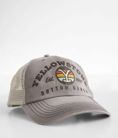 a gray hat with the words yellowstone and an image of a rainbow on it's front