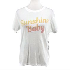 Wildfox White Sunshine Baby Graphic Short Sleeve T-Shirt Short Sleeve T-Shirt With Graphic "Sunshine Baby" Keke Top. Approximate Measurements: Pit To Pit: (S, 19”) (L, 21”) Length: (S, 23.5”) (L, 24.5”) Condition: New With Tags Made In: China Inventory: Wt2751.4.13 White Soft-washed Fun Tops, Fun White Soft-washed Tops, Fun Soft-washed White Tops, Soft-washed White Fun Top, Soft-washed Tops For Spring And Summer, Soft-washed Tops For Beach In Spring, Soft-washed Beach Tops For Spring, Soft-washed Tops For Spring Beach, Spring Vacation Soft-washed Tops