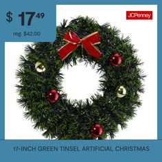 a christmas wreath with red bows and bells on it for $ 17 99 reg $ 42 00