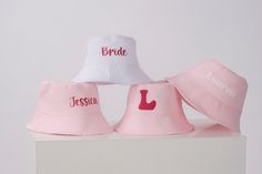 "Personalized Hats, Unisex Bucket Hats, Wide Brim Hats, Custom Outdoor Summer Cap, Best Bucket Hats, Pink Bucket Hats, Personalized Gift Hats, Personalized Bucket Hat Gift Custom Pink Bucket for bridesmaids gift or wedding favor. Floppy Beach Hat Personalized Bride Hat Floppy Hat with Name Custom Personalized Beach Hat Unisex Fisherman hat Honeymoon Must Have Honeymoon Gifts. Bridal shower gift. Our made of honor gift hats are specially made for your name or anything you want. Amazing aesthetic Cotton Bucket Hat For Gift, Cotton Bucket Hat Gift, Customizable Bucket Hat, One Size Fits Most, Customizable Bucket Hat One Size Fits Most, Customizable Bucket Hat One Size, Customizable One Size Bucket Hat, Personalized Adjustable Bucket Hat, Customizable Bucket Hat, White Bucket Hat As Gift