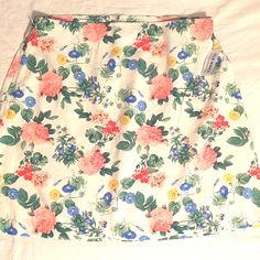 Old Navy New With Tags Side Zip Hidden Elastic Waist Waist 16" Across Length19" Spring Beach Floral Print Skort, White Floral Print Mini Skirt For Summer, Floral Print Skort For Spring Vacation, Spring Vacation Floral Print Skort, White Lined Skort For Spring, White Lined Skirt Skort For Spring, White Floral Print Skirt For Day Out, White Mini Skirt For Spring Vacation, Fitted White Floral Print Skort