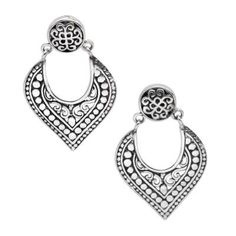 Balinese artisan Suar Dwipayana crafts this pair of 925 sterling silver dangle earrings in brilliant detail. A heart-shaped shield accented with gleaming circles swings from an stud with a woven-vine pattern. A combination of oxidized and high-polish finishes makes this pair of earrings a truly eye-catching addition to your collection. Traditional Nickel-free Sterling Silver Teardrop Earrings, Traditional Sterling Silver Teardrop Earrings As Gift, Silver Bohemian Heart Drop Earrings, Traditional Silver Teardrop Pierced Earrings, Traditional Silver Heart Earrings, Bohemian Silver Heart Drop Earrings, Sterling Silver Filigree Jewelry For Festivals, Traditional Silver Heart Earrings For Gift, Traditional Sterling Silver Teardrop Earrings