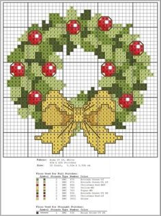 a cross stitch christmas wreath with holly leaves