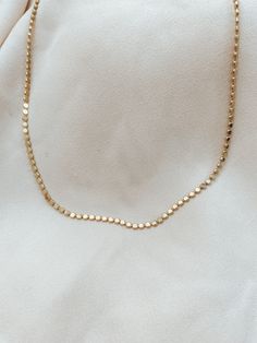 Our beautiful Dot Chain is an easy way to make a big statement and is perfect to wear anytime. This chain looks beautiful on its own or mixed and matched. High quality chain necklace, gold filled, nickel-free and hypoallergenic.This’s one of my favorite chains from my new collection. The different shapes make them look so classy, unique, and shiny! YOU’LL LOVE IT!! DETAILS: •Material: 14K gold-filled, sterling silver •Lengths : 14" - 18" inches • Thickness: 2mm•features the perfect chain for mak Dainty Gold Chain Round Necklaces, Dainty Round Gold Chain Necklace, Delicate Satellite Chain Necklace, Minimalist Round Chain Necklace With Satellite Chain, Minimalist Round Satellite Chain Necklace, Minimalist Satellite Chain Necklace, Minimalist Silver Chain Necklace 14k Gold Filled, Minimalist Sterling Silver Necklace With Gold Chain, Chic Gold Sterling Silver Chain Necklace