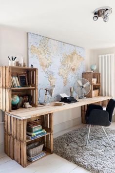 an image of a room with a map on the wall and furniture in front of it