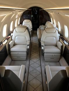 the inside of an airplane with leather seats