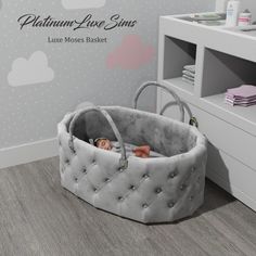 a baby's cradle in the corner of a room with clouds on the wall