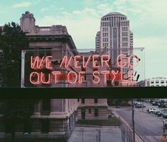 a neon sign that says we never go out of style