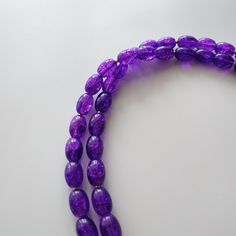 < Long glass beaded necklace with amethyst stone pendant > Very original and elegant combination. The stone is natural amethyst. Amethyst is the stone of St. Valentine and faithful love. It carries the energy of fire and passion, creativity and spirituality. This necklace can be beautiful accent to any look! > Necklace length - 89 cm (35 in) > Necklace weigth - 78 gm Purple Polished Beads Crystal Necklace As Gift, Purple Glass Beaded Necklaces With Round Beads, Purple Glass Beaded Necklace With Round Beads, Spiritual Purple Spacer Beads, Purple Faceted Beads Crystal Necklace For Spiritual Use, Purple Amethyst Beads For Jewelry Making, Purple Oval Faceted Bead Necklaces, Purple Necklaces With Faceted Oval Beads, Purple Oval Beaded Necklace